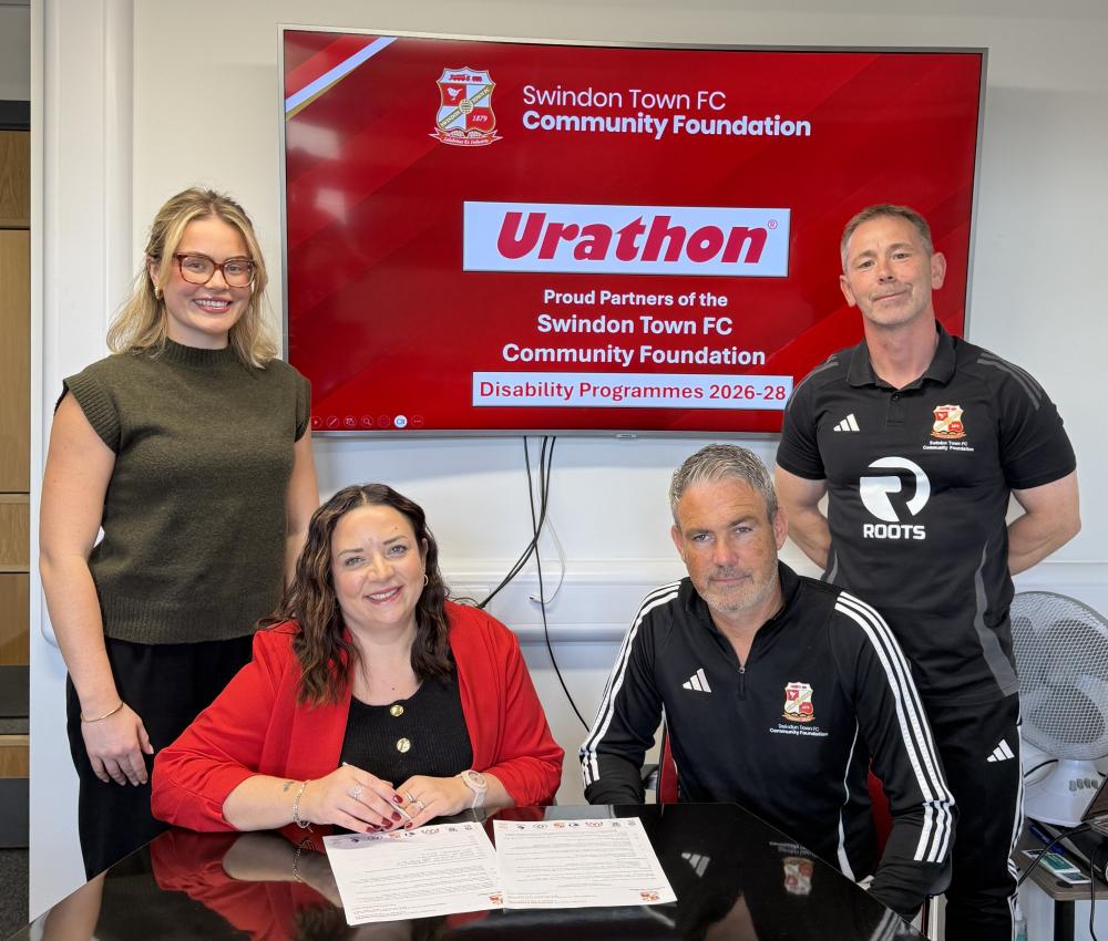 From left: Urathon’s Alyx Blick and MD Lucy Carson, with Swindon Town FC Community Foundation’s Shane Hewlett and Darren Howell