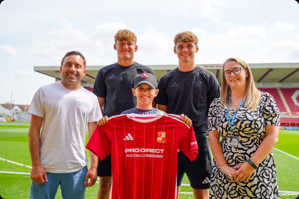From left: Ben Grayburn, Advantage Sponsorship who bought this partnership together and his son together with Swindon Town Football Club's Fletcher Holman and Ben Middlemas and Hannah White representing NHS Swindon Talking Therapies